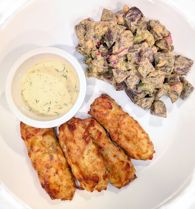 >Fish sticks and purple potato salad.